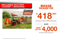 Kubota BX23S compact tractor with factory loader and backhoe digging and trenching on a job site