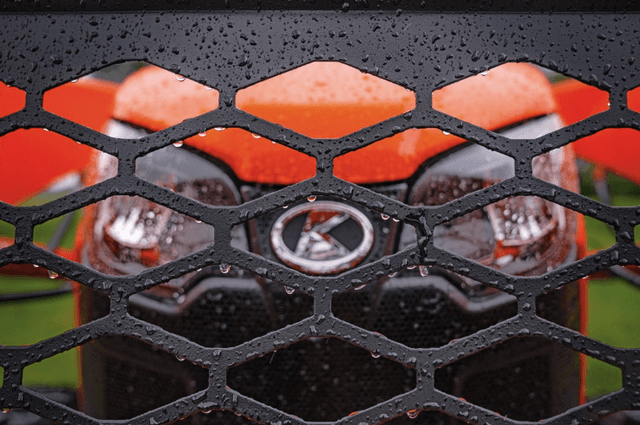 Close up shot of the front of a tractor