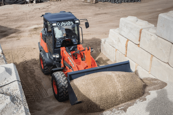 Wheel Loader scooping up gravel
