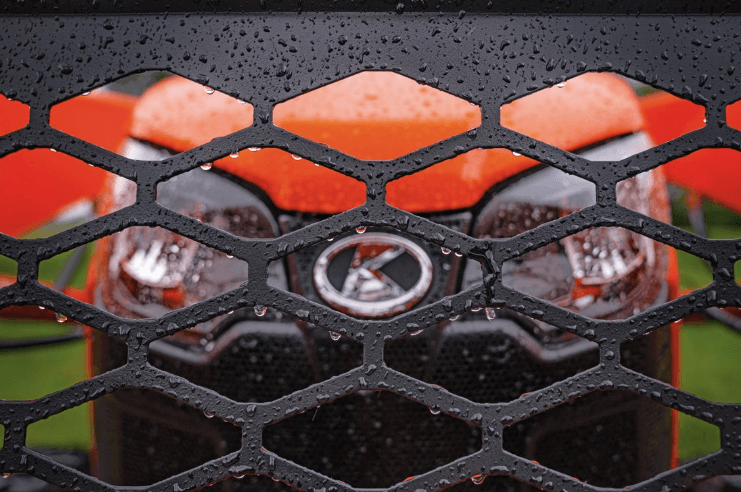 Close up shot of the front of a tractor