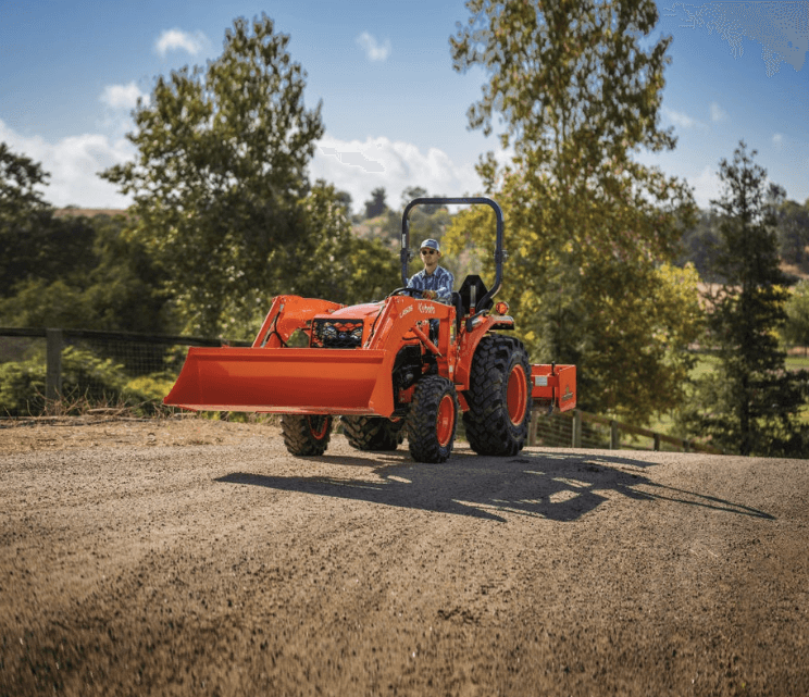 Tractor driving down the road